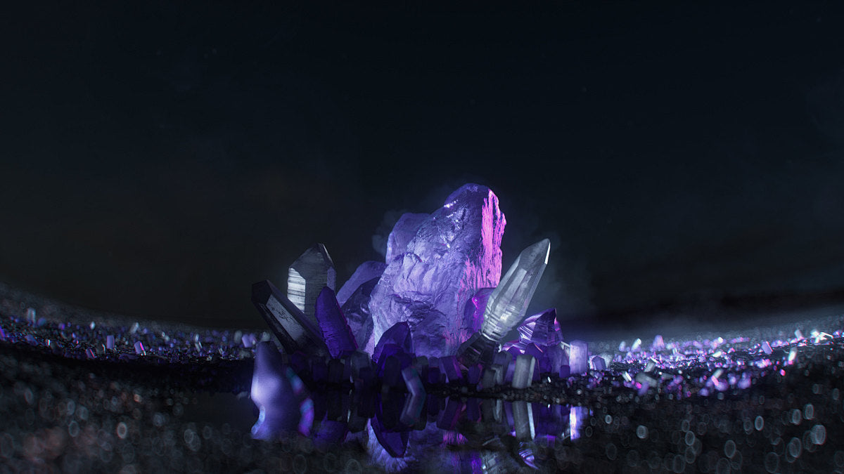 A cluster of clear quartz crystals illuminated against a dark, moody background. A visual representation of visual silence and physical grounding, illustrating how Jambhala uses transparent stones to cut through the noise of modern life.
