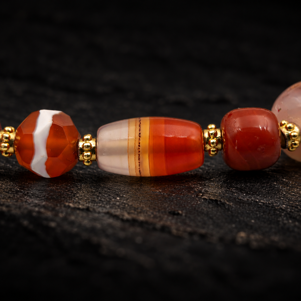 BIFANG Etched Agate Bracelet – close-up detail on black slate background
