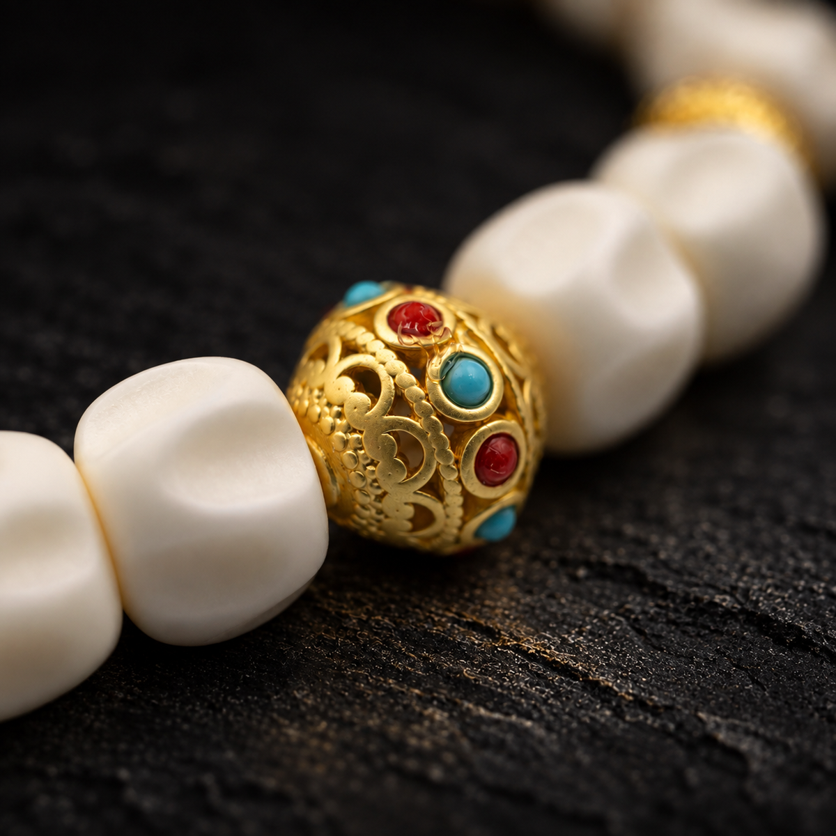 DIJIANG Shed Antler Bracelet – close-up detail on black slate background