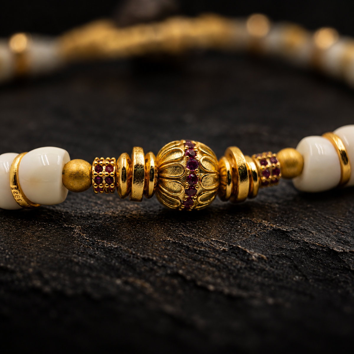 FUZHU Shed Antler Bracelet – close-up detail on black slate background