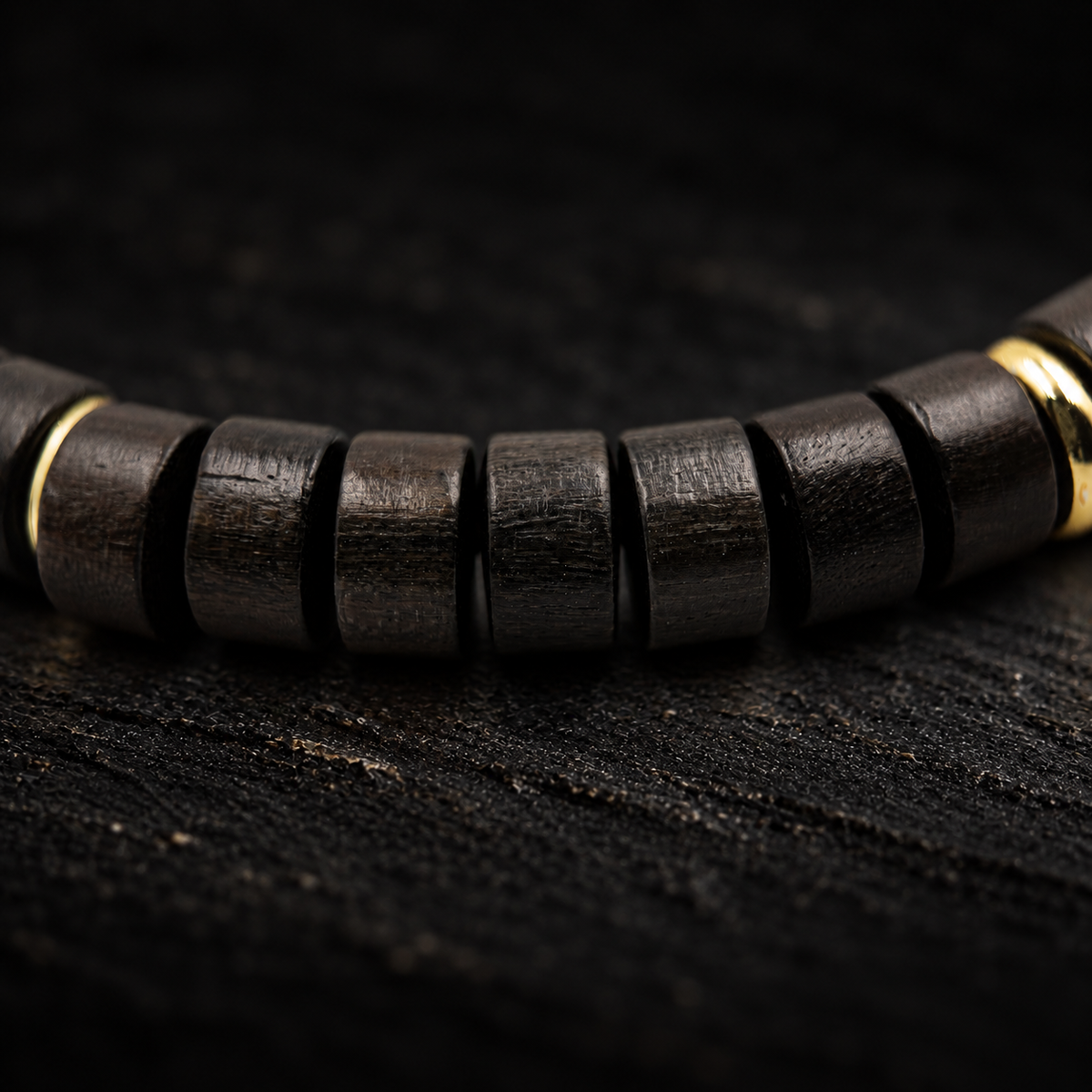KUI Sandalwood & Agate Bracelet – close-up detail on black slate background
