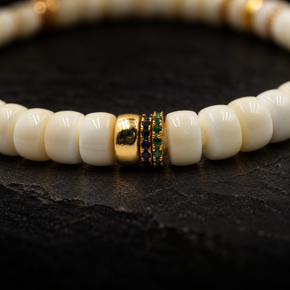 QINGFU Shed Antler Bracelet – close-up detail on black slate background
