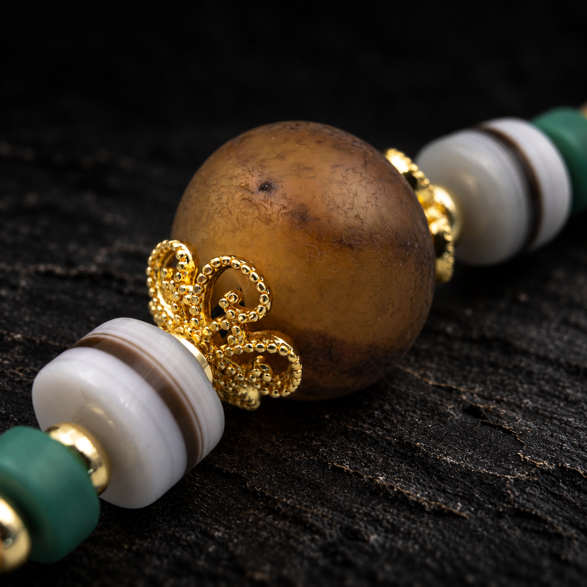 QIULONG Carnelian Necklace – close-up detail on black slate background