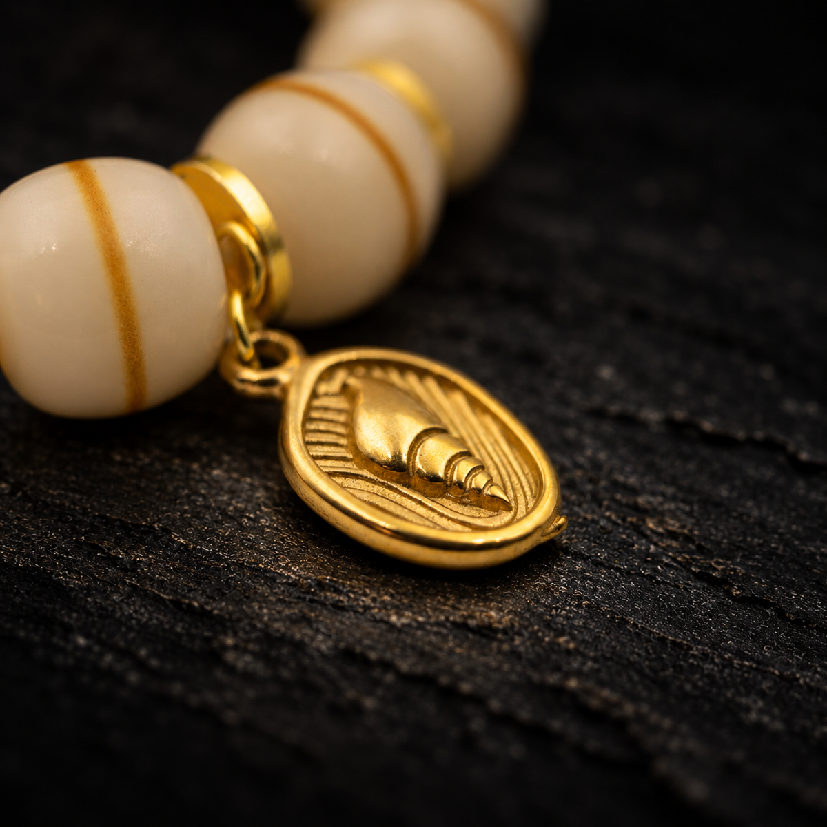 RANYI Bodhi Seed Bracelet – close-up detail on black slate background