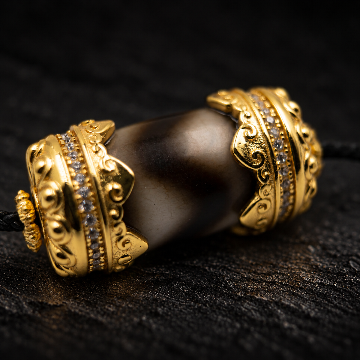 YINGZHAO Dzi Agate Necklace – close-up detail on black slate background